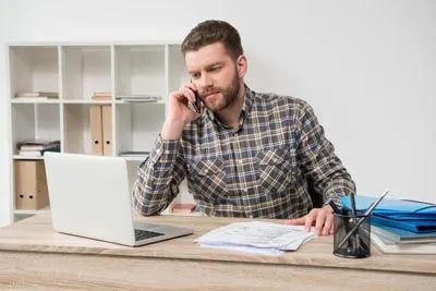 man scheduling his dental appointment at Hopewell Family Dentistry