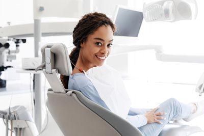 woman smiling during her visit to Hopewell Family Dentistry
