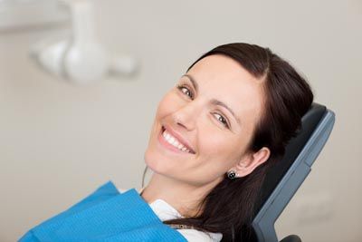 woman smiling during her visit to Hopewell Family Dentistry