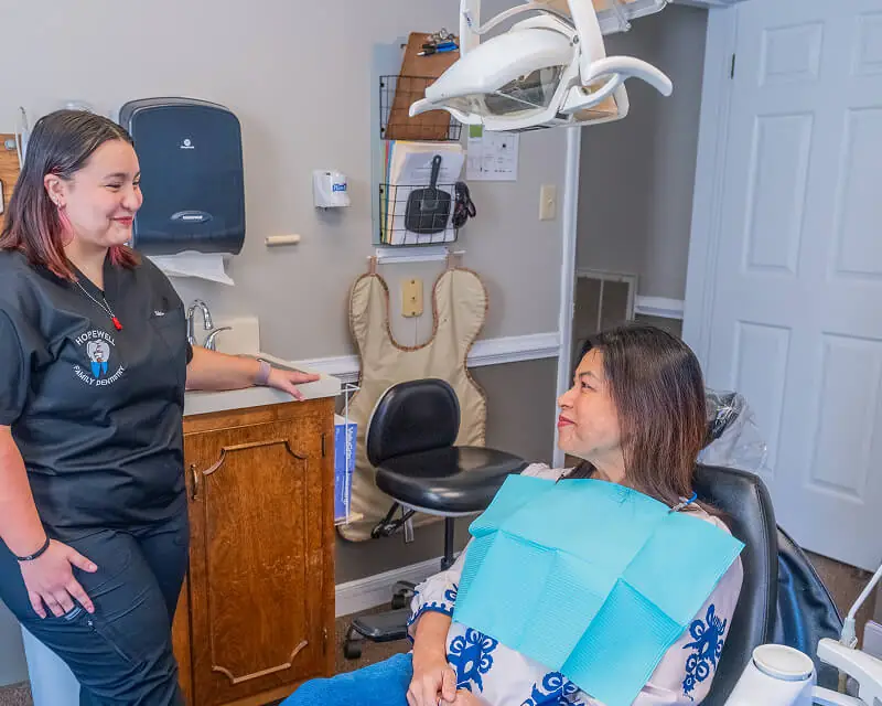 Hopewell Family Dentistry team member chatting with patient